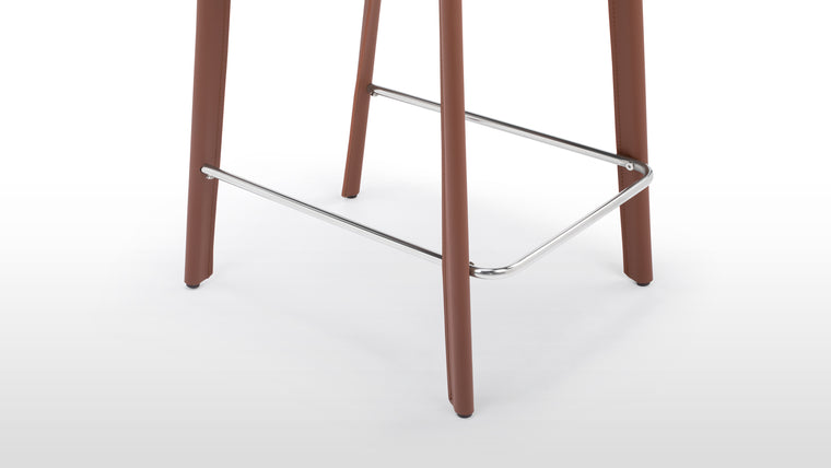 Sturdy Construction | Built to last, the Domus Stools are supported by robust frames that provide stability and reliability for everyday use.
