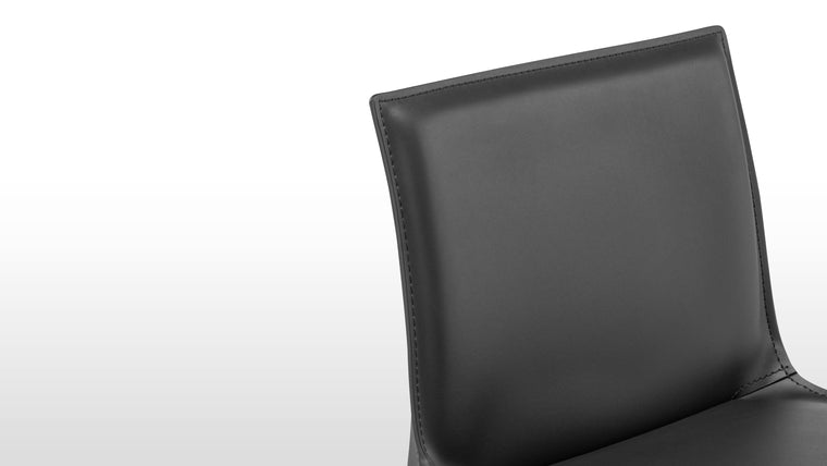 Premium Leather Upholstery | Enjoy the supple feel and enduring quality of top-grade leather that covers every inch of the stool, from seat to legs.
