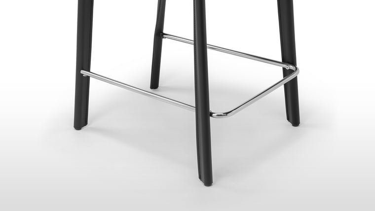 Sturdy Construction | Built to last, the Domus Stools are supported by robust frames that provide stability and reliability for everyday use.
