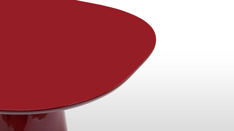 High Gloss Radiance | Crafted with a premium lacquered finish, the Omega's surface gleams with a mirror-like sheen—amplifying both natural and ambient light for an elevated dining experience.
