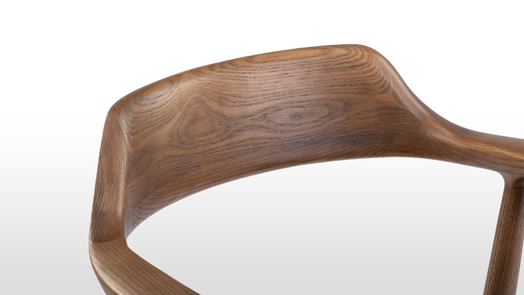 Contoured Comfort | The chair's seat and backrest feature gentle curves to provide ergonomic support, ensuring comfort during extended use. The armrests are designed for a relaxed and natural resting position, enhancing overall comfort
