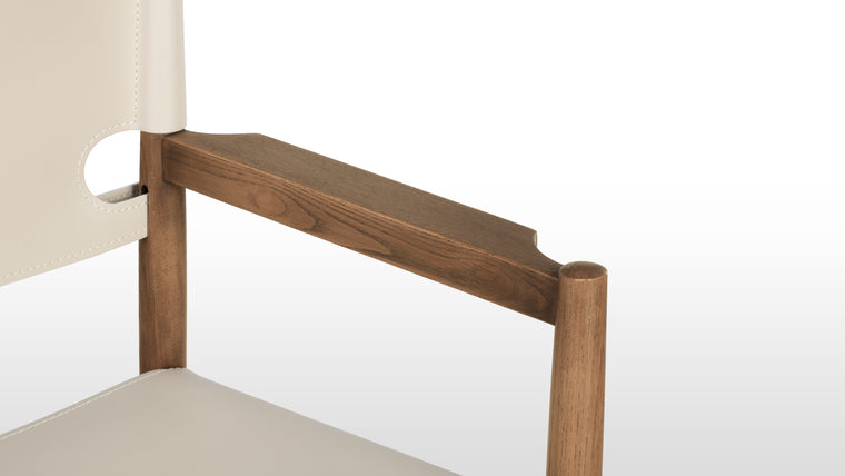 Sophisticated Sling | With its gently curved backrest and contoured sling seat, the Aksel Dining Chair offers exceptional comfort during mealtimes. The carefully chosen vegan leather upholstery adds a touch of luxury and elegance while allowing comfortable sitting and entertaining for hours.
