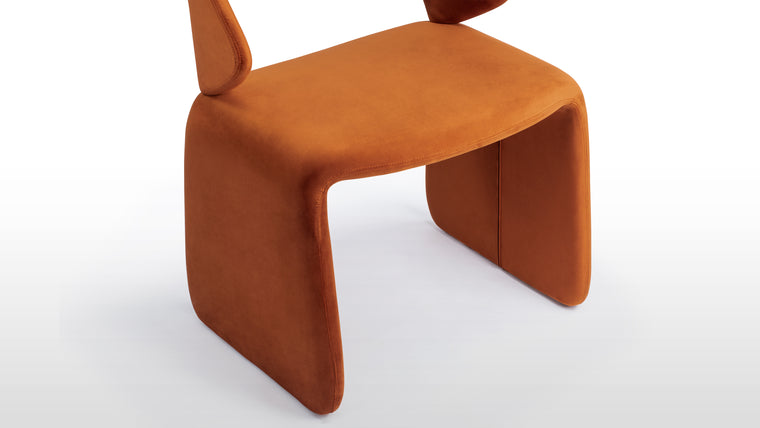 Curved Support | Designed for comfort and stability, the Suit Chair’s curved backrest supports posture while its sturdy legs ensure durability. Whether for dining, working, or lounging, it’s made to enhance both form and function.
