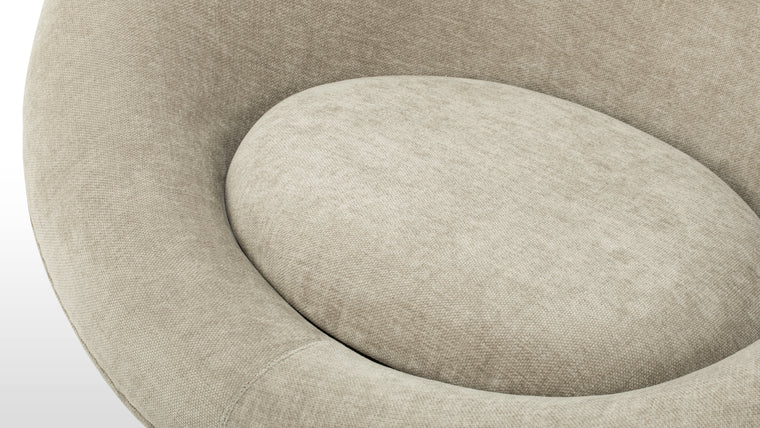 Built for Balance | Constructed around a resilient internal shell, the chair achieves its plush exterior without sacrificing support. Its base is subtly reinforced, allowing for a grounded, stable presence while maintaining the illusion of lightness and buoyancy.
