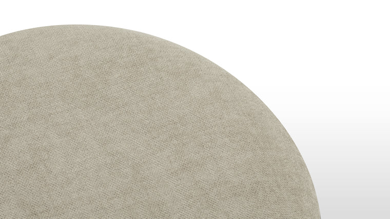 Textural Warmth | Wrapped in a rich chenille upholstery, the ottoman brings a sense of warmth and depth while emphasizing its soft, architectural silhouette.
