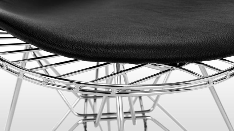 Seating Reshaped | The interplay between the gentle curves and clean lines of this design demarcate the Wire chair as a design classic. Made with care from high-quality materials, this chair was designed with durability in mind, making it a great fuss-free choice for busy homes with kids and pets.
