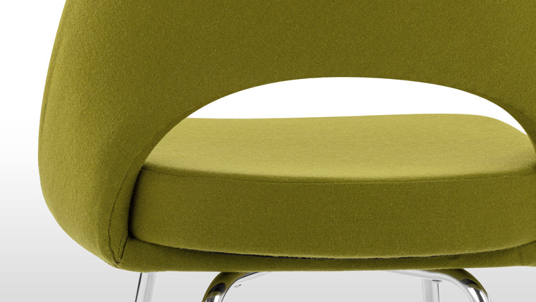 CURVES AHEAD | Specially curved to support the body, this chair is a comfortable addition to a dining room or elsewhere.
