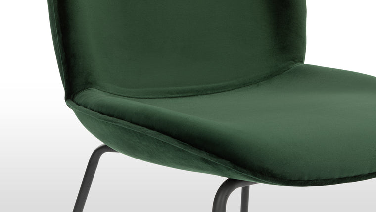 CHIC SHAPES |  Curves and lines play beautifully together to create the contemporary design of this unique dining chair.
