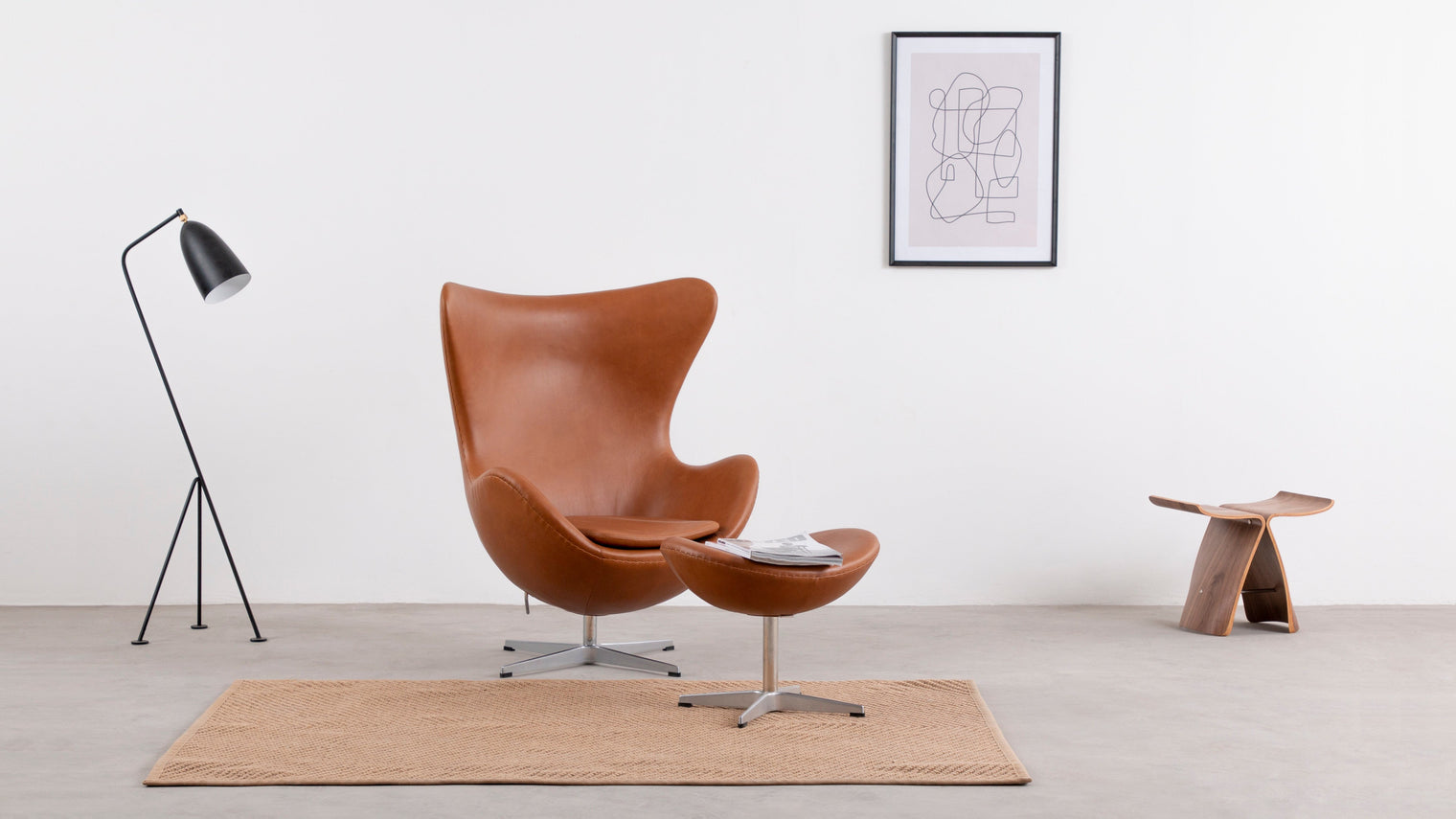 Excellent versatility|Designed to complement the famous Arne Chair, the Arne Stool adds comfort and style to the stunningly sophisticated chair. Not to be overshadowed by its predecessor, the stool is quite lovely and versatile on its own. It can be utilized as a traditional footstool or ottoman, and it’s also ideal for extra seating.
