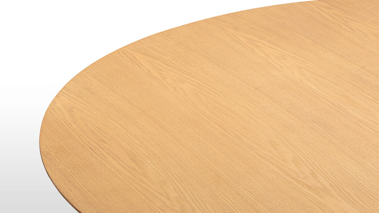 Quality Craftsmanship | Made from ash hardwood in a coated natural finish, this beautiful contemporary table features a moon-like circular top, refined by its bevelled edge, and heavy pedestal base which is visually softened by ash reeding.
